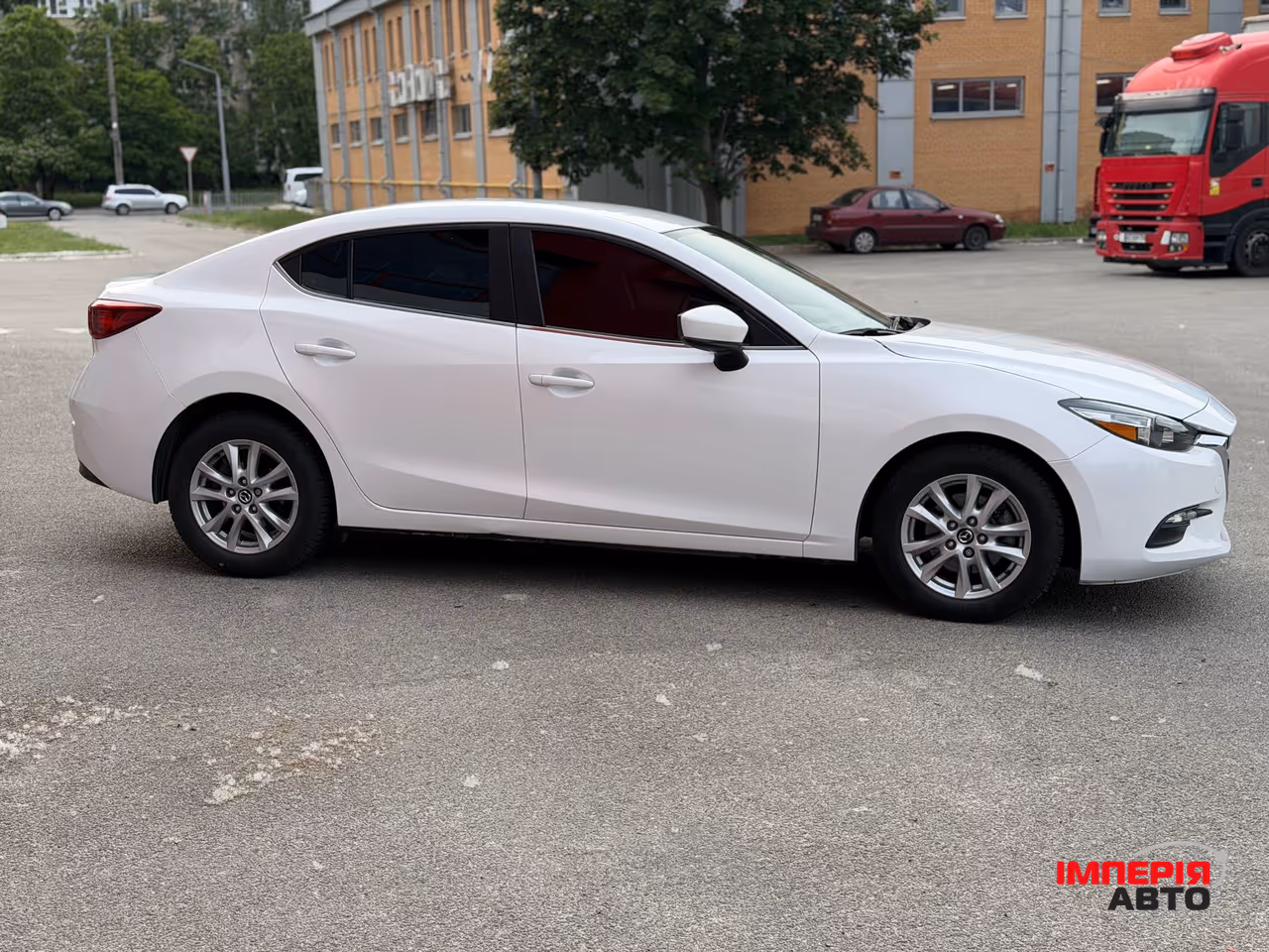 Mazda 3 - фото 4