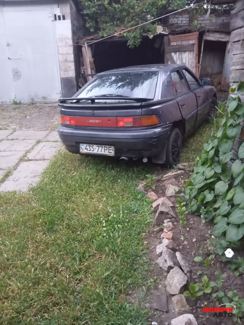 Mazda 323 - фото 2