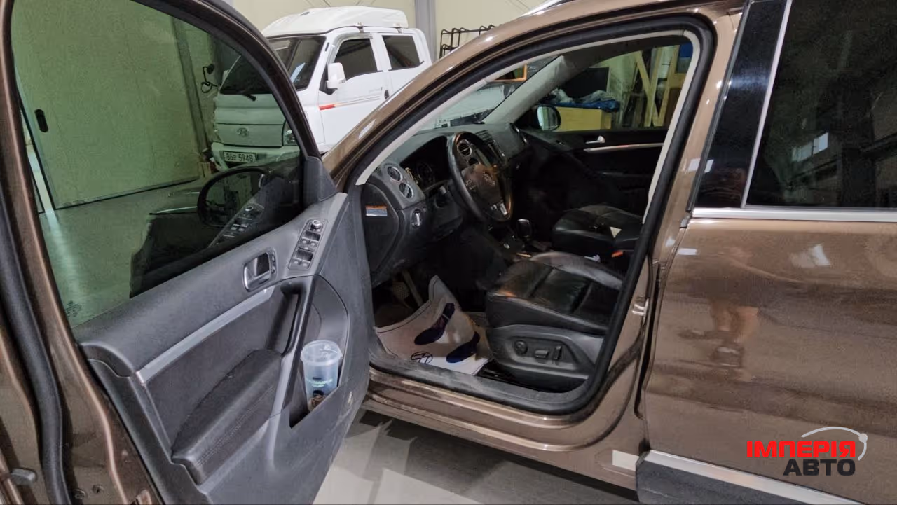 Volkswagen Tiguan - фото 13