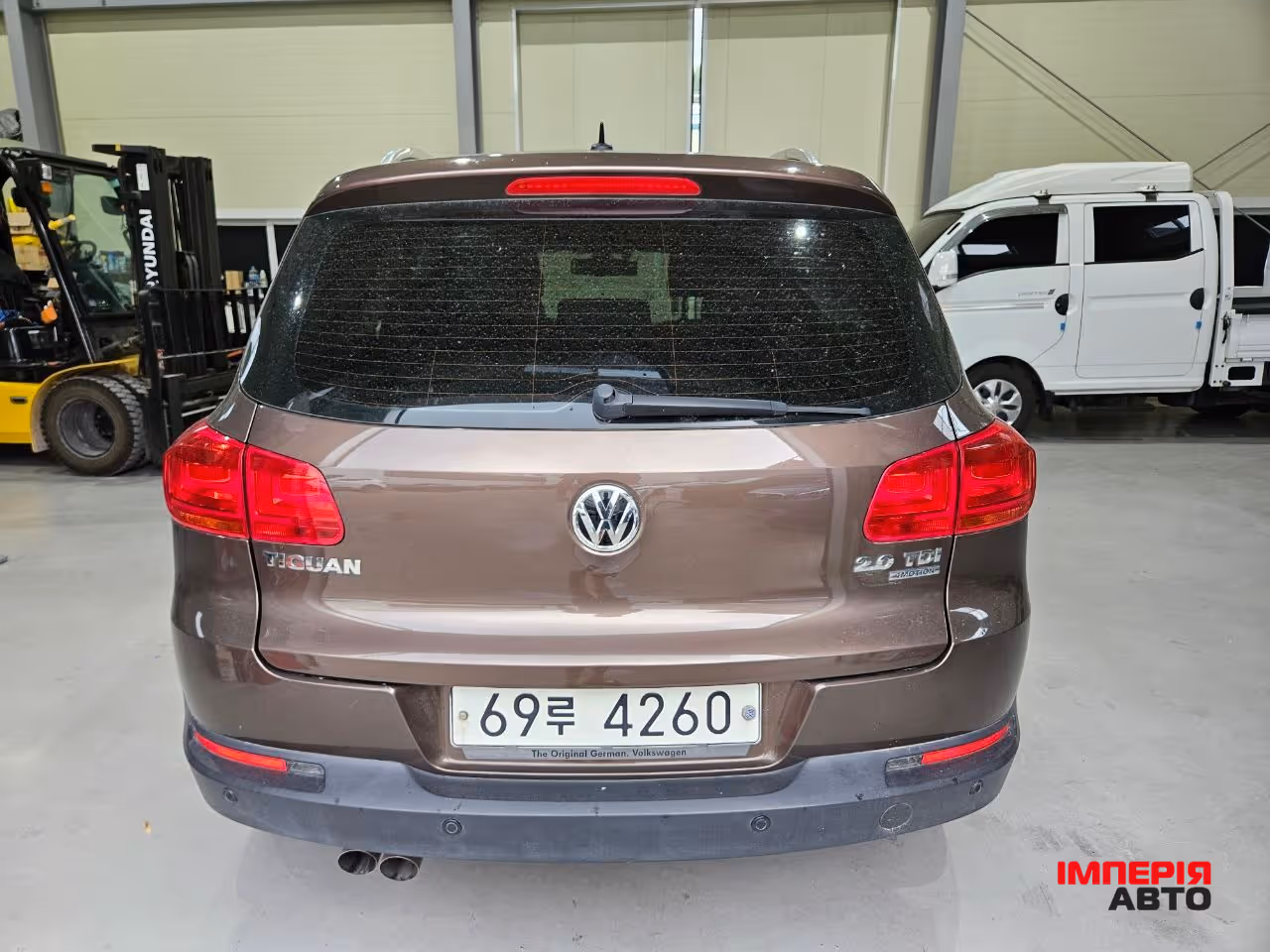 Volkswagen Tiguan - фото 8