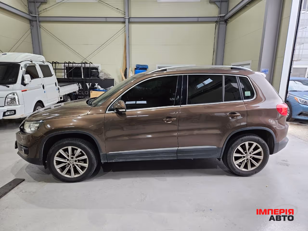Volkswagen Tiguan - фото 2