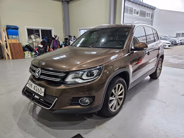 Volkswagen Tiguan - фото 1