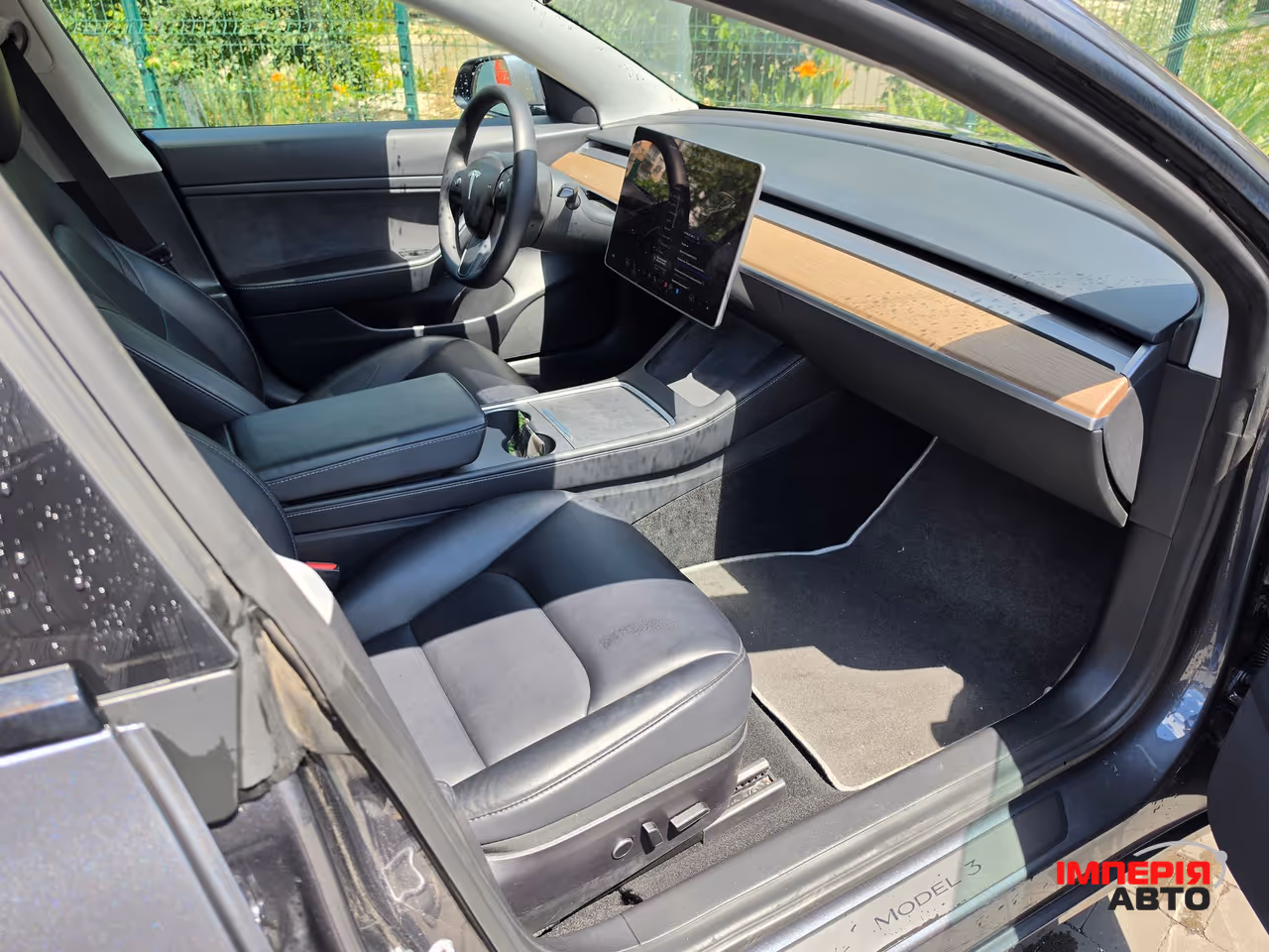 Tesla Model 3 - фото 10