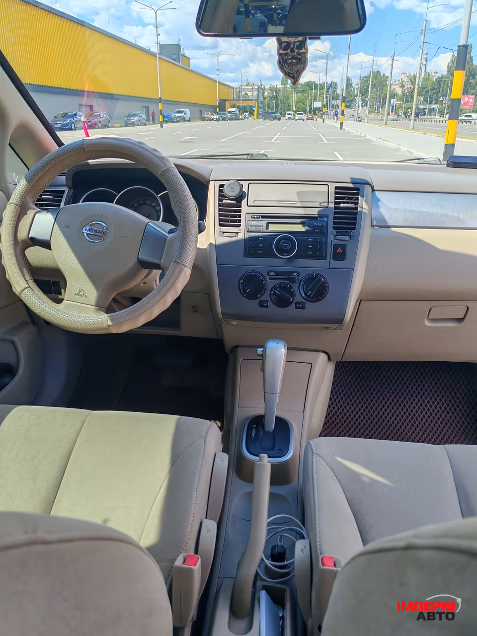 Nissan Tiida - фото 11