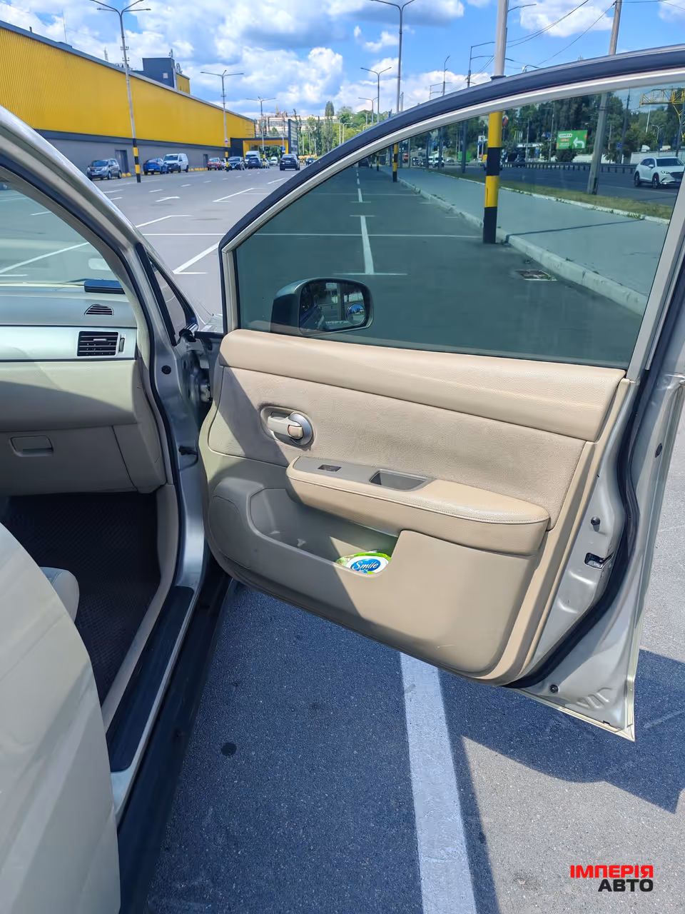 Nissan Tiida - фото 7