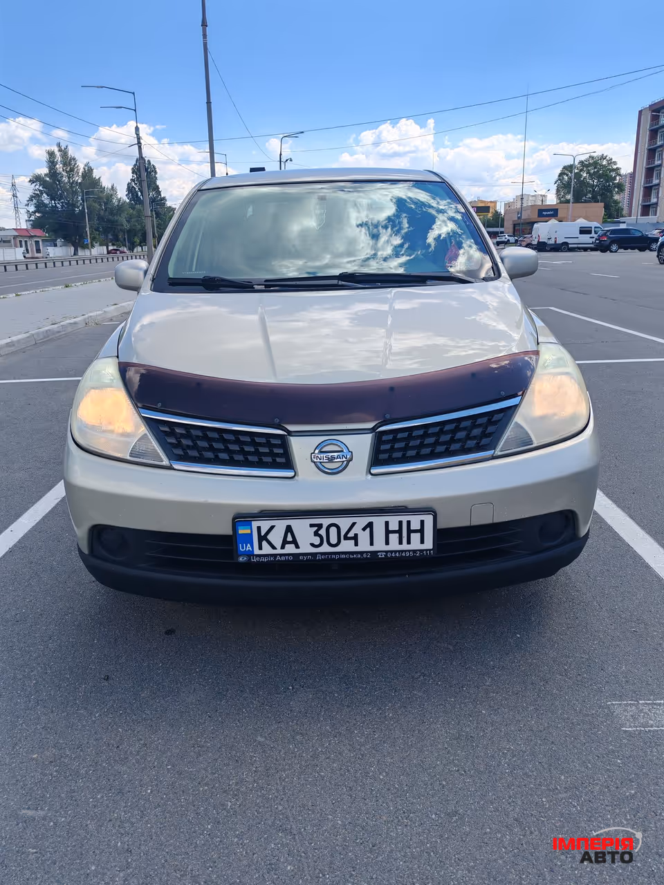 Nissan Tiida - фото 2