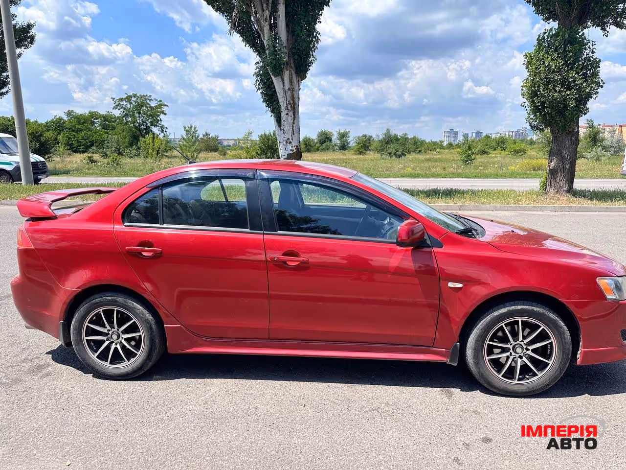 Mitsubishi Lancer - фото 4