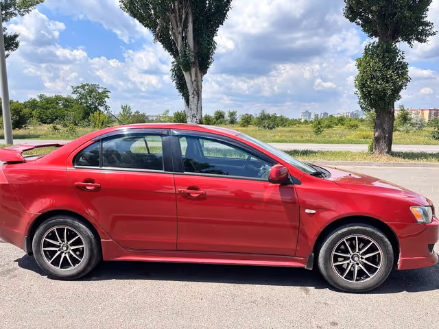 Mitsubishi Lancer - фото 1