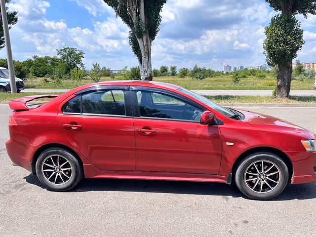 Mitsubishi Lancer - фото 4