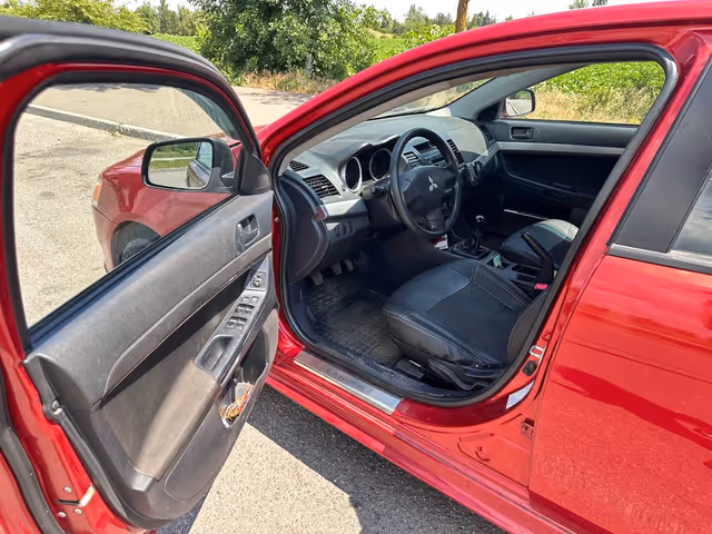 Mitsubishi Lancer - фото 5