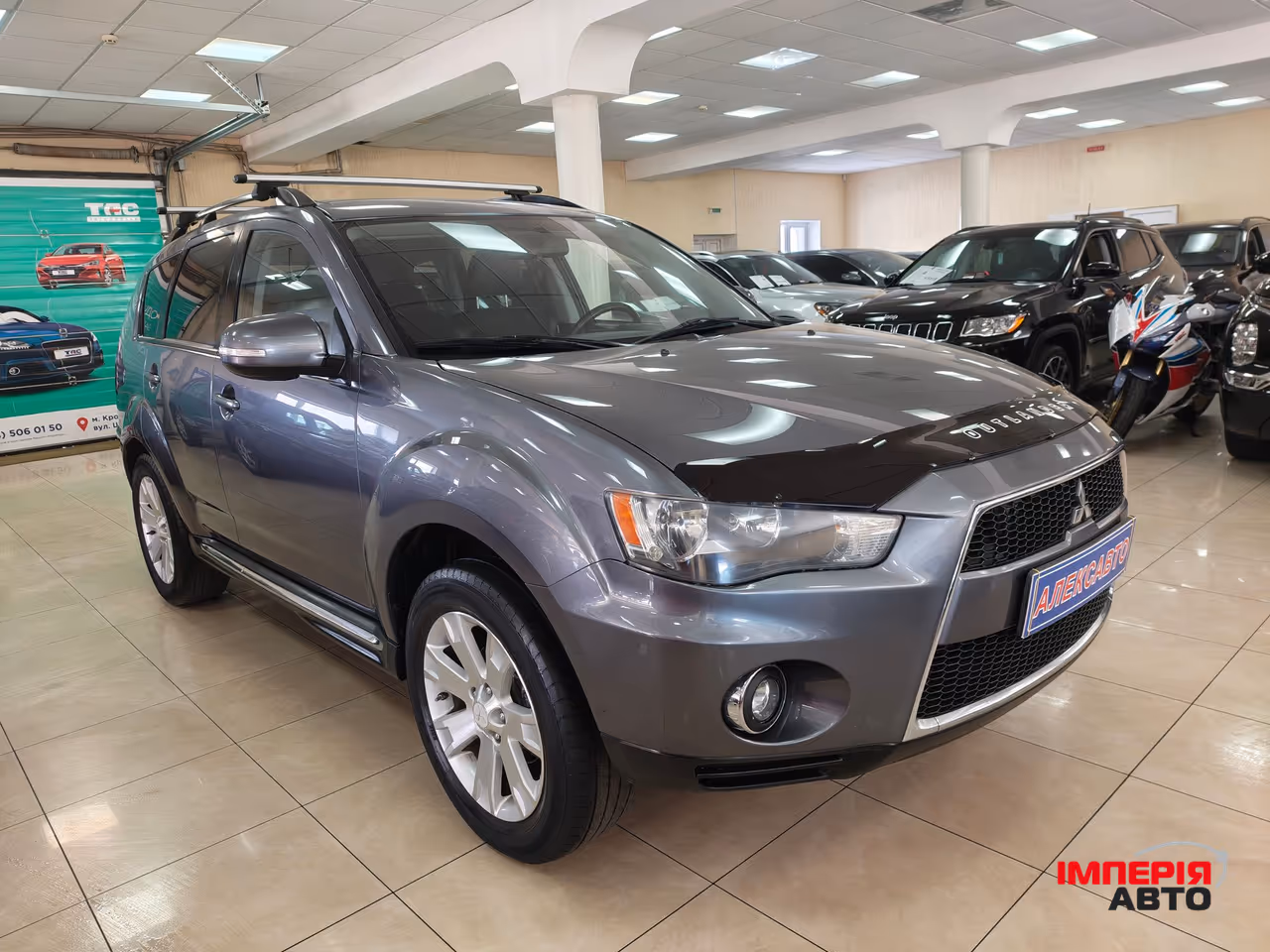 Mitsubishi Outlander - фото 1