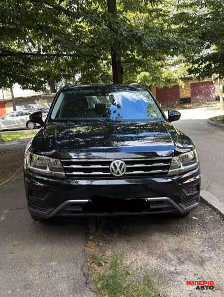 Volkswagen Tiguan - фото 1