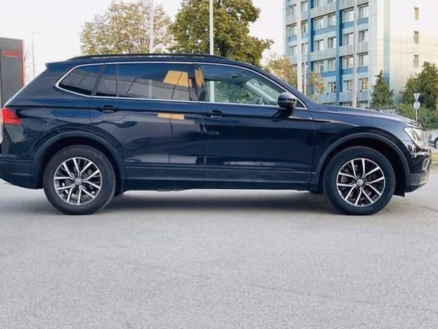 Volkswagen Tiguan - фото 5