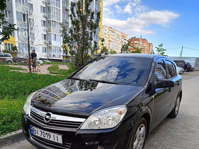 Opel Astra - фото 1