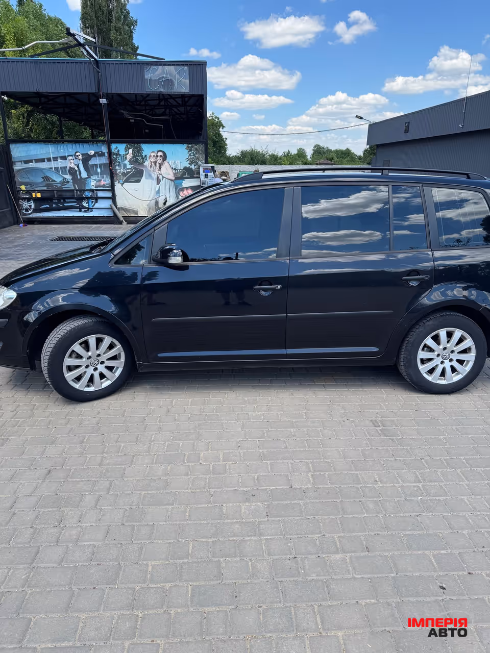 Volkswagen Touran - фото 4