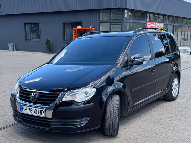 Volkswagen Touran - фото 3