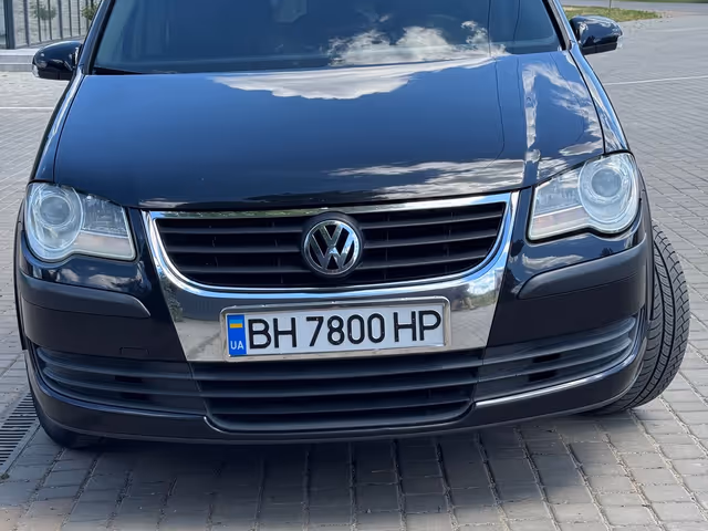 Volkswagen Touran - фото 2