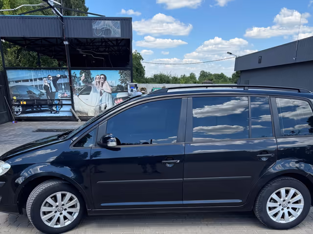 Volkswagen Touran - фото 4