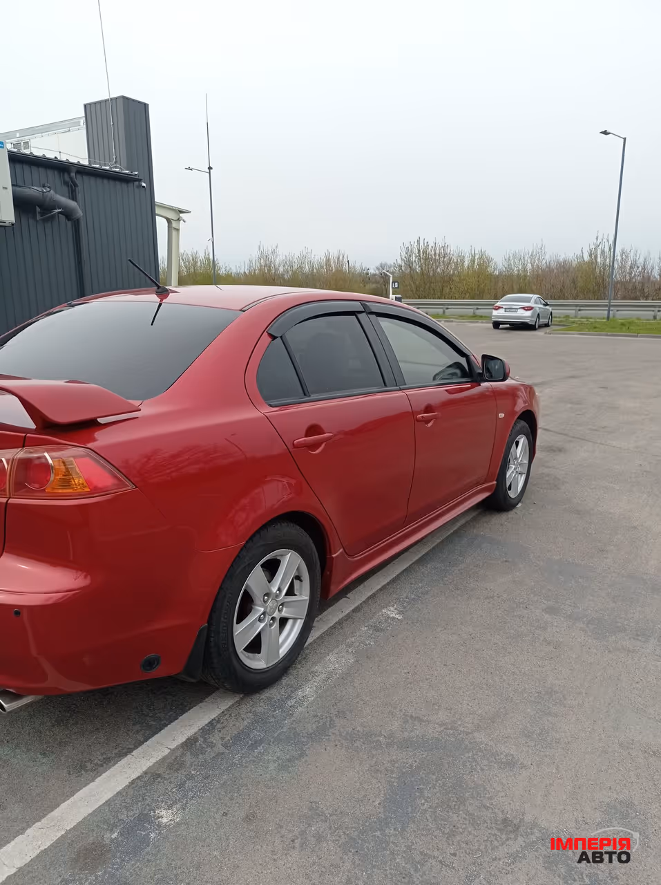 Mitsubishi Lancer - фото 12