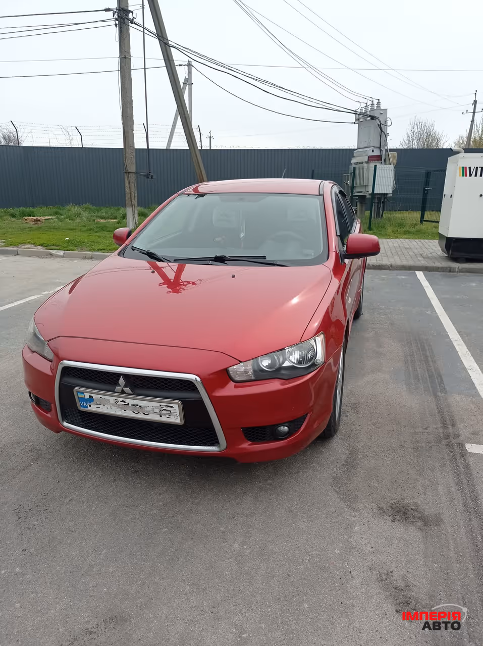 Mitsubishi Lancer - фото 1