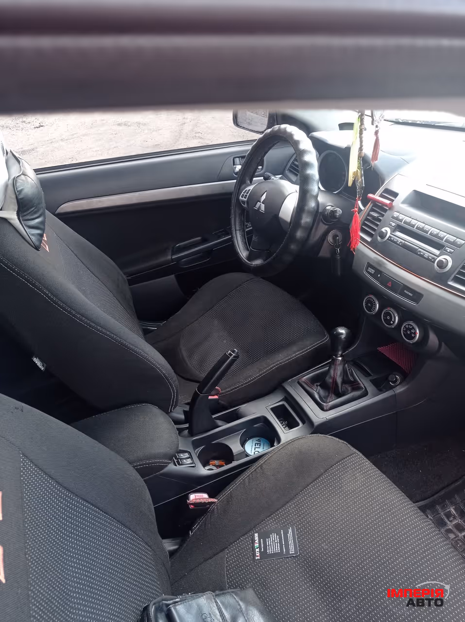 Mitsubishi Lancer - фото 13