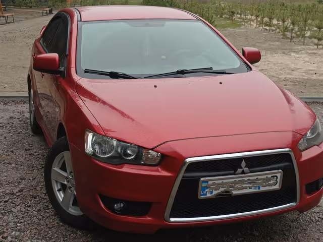 Mitsubishi Lancer - фото 4
