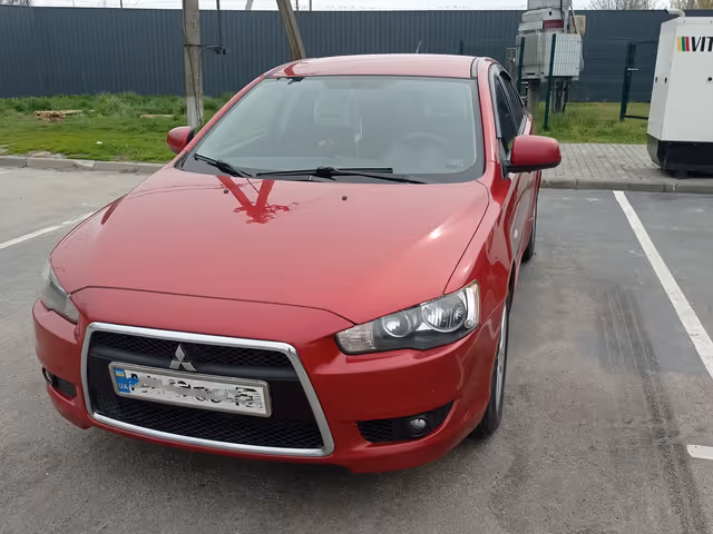 Mitsubishi Lancer - фото 1