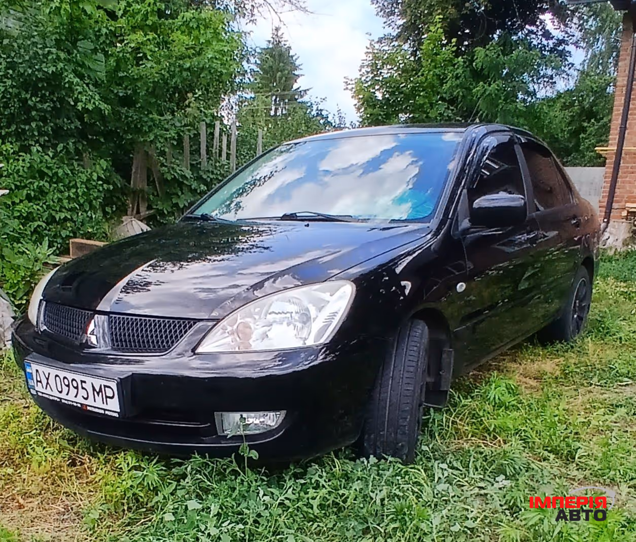 Mitsubishi Lancer - фото 1