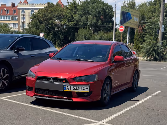 Mitsubishi Lancer - фото 1