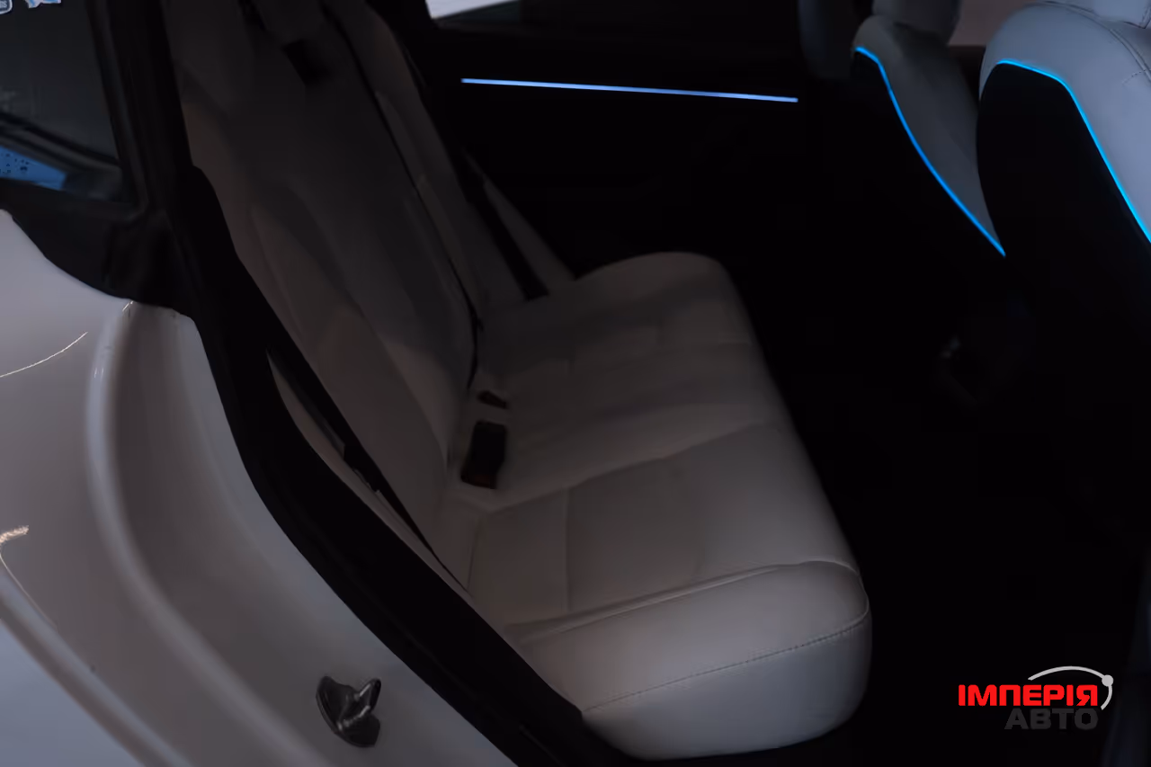 Tesla Model 3 - фото 9
