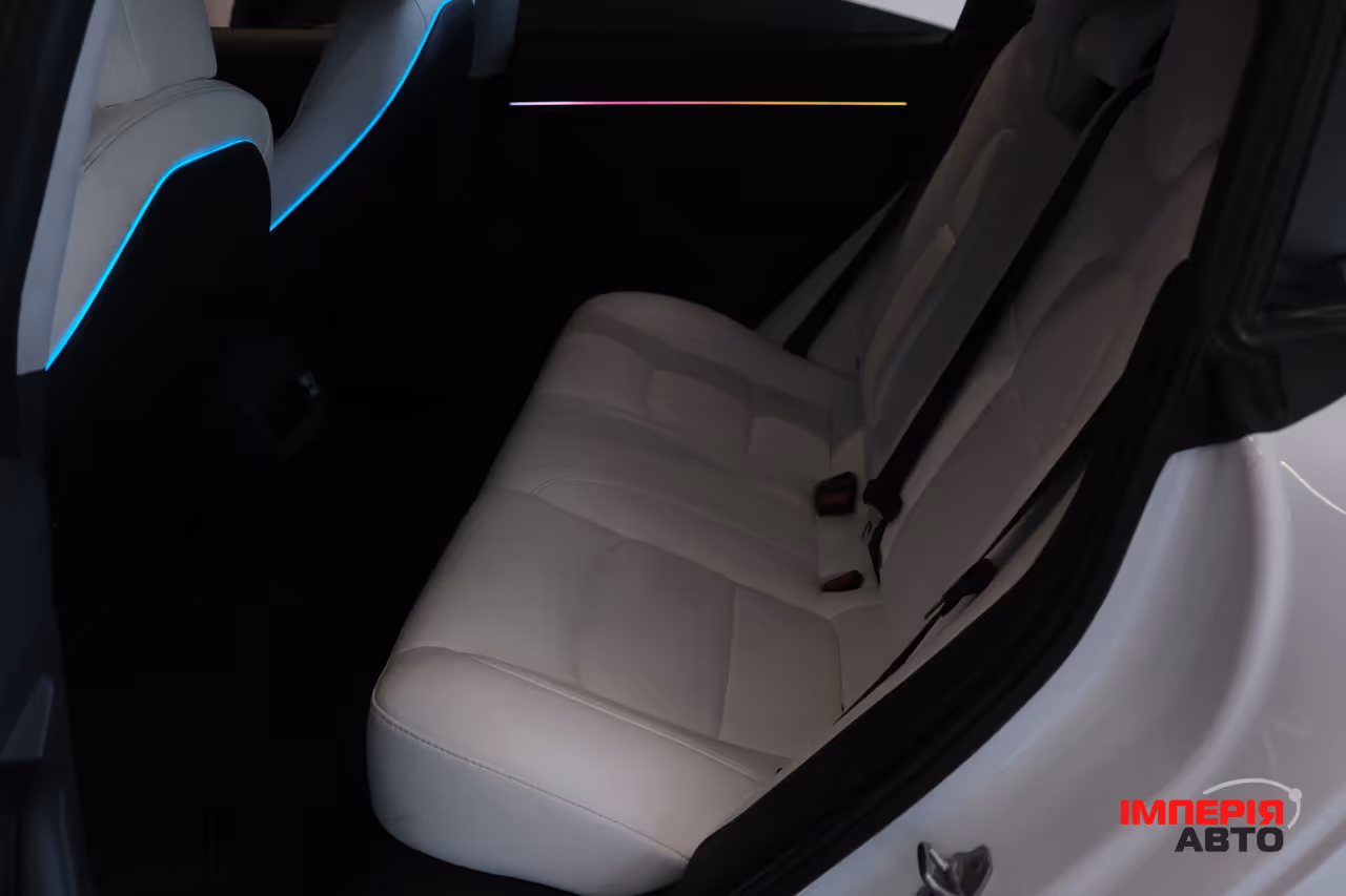 Tesla Model 3 - фото 8