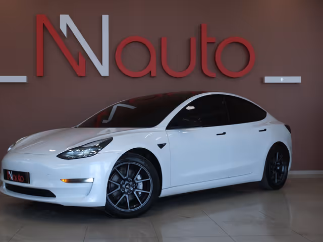 Tesla Model 3 - фото 1