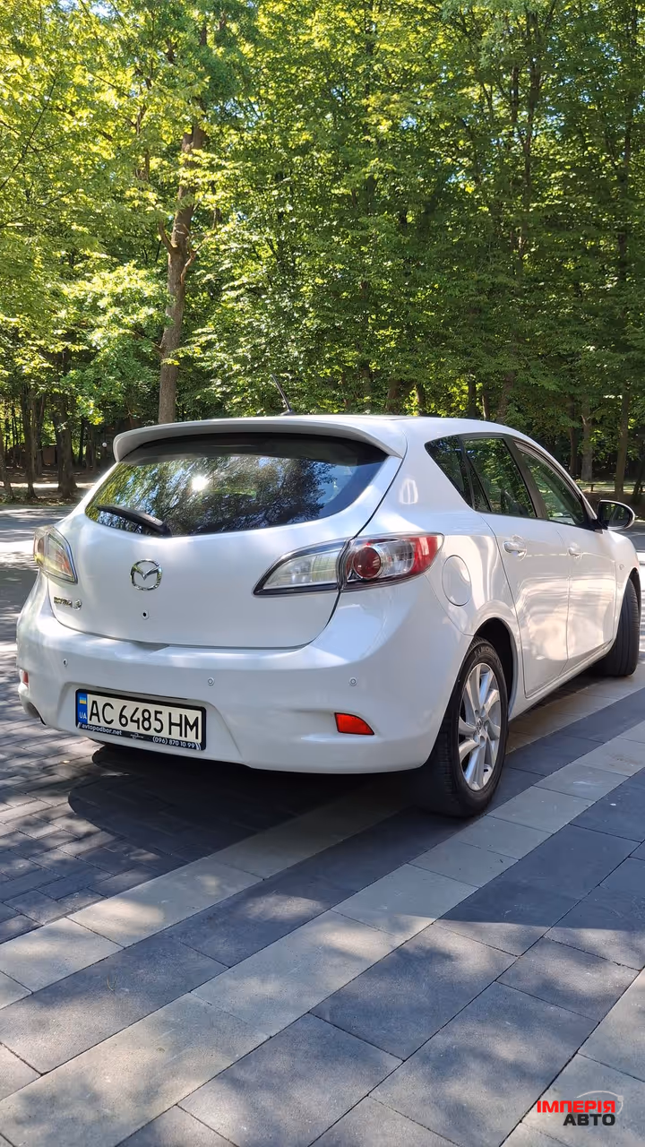 Mazda 3 - фото 14