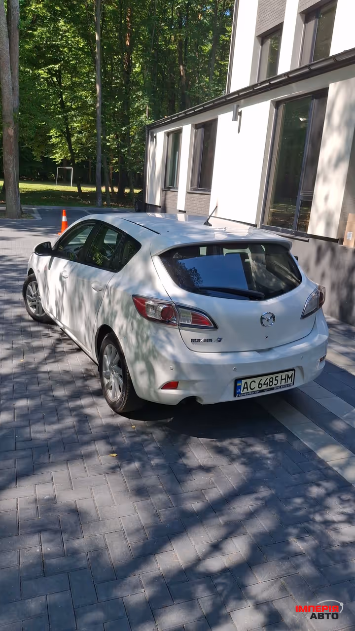Mazda 3 - фото 12