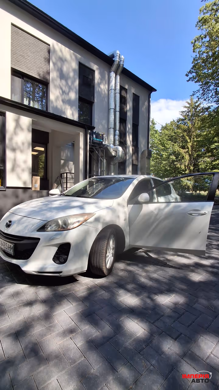 Mazda 3 - фото 1