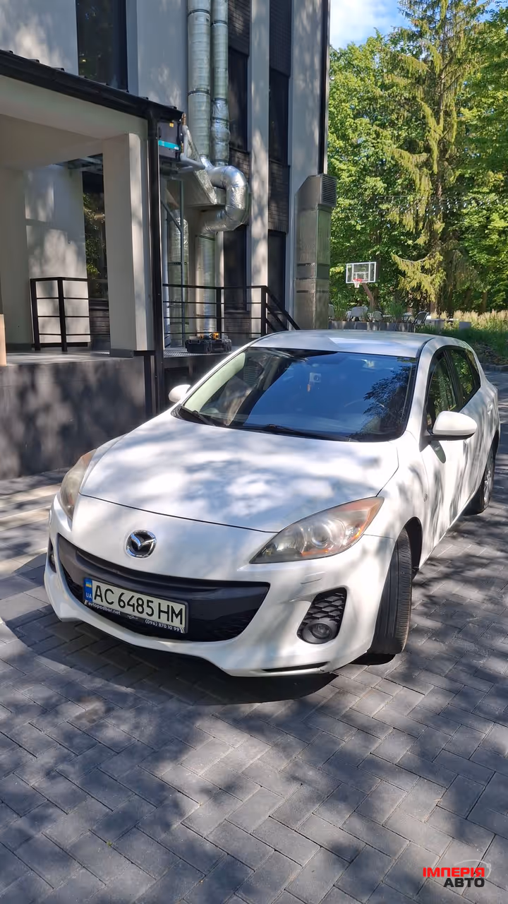 Mazda 3 - фото 10