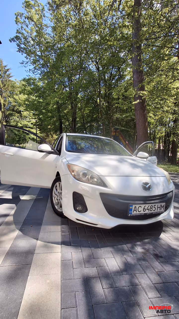 Mazda 3 - фото 2