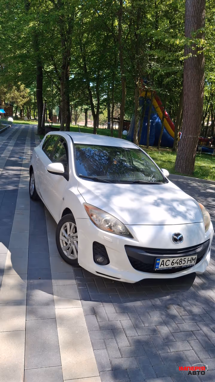 Mazda 3 - фото 13