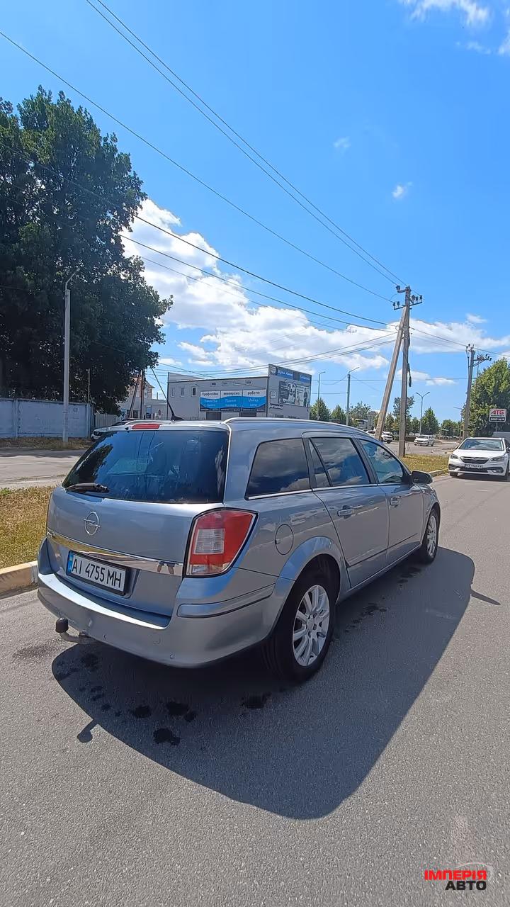 Opel Astra - фото 6
