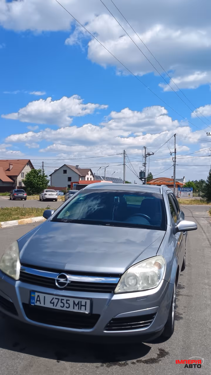 Opel Astra - фото 2