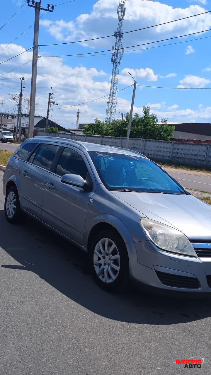 Opel Astra - фото 1