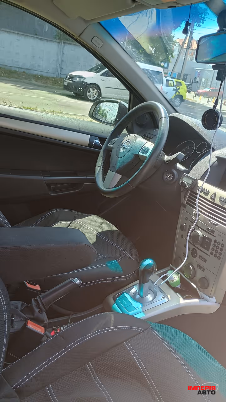 Opel Astra - фото 8