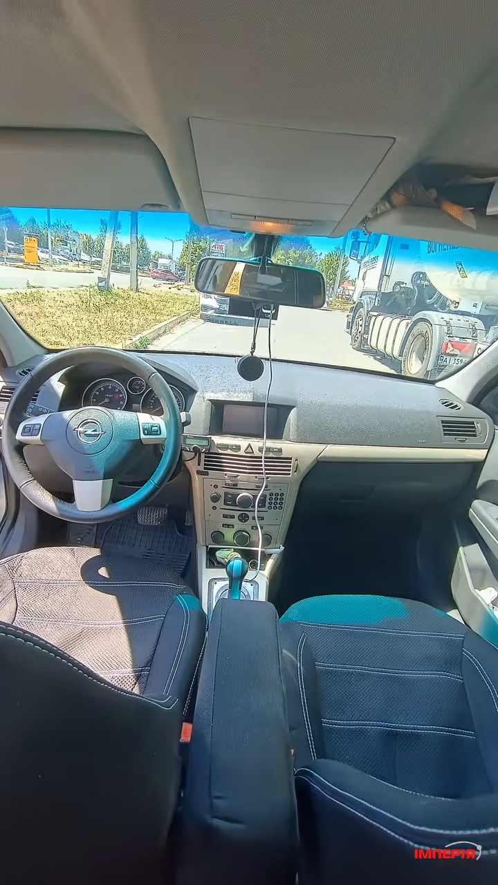 Opel Astra - фото 10