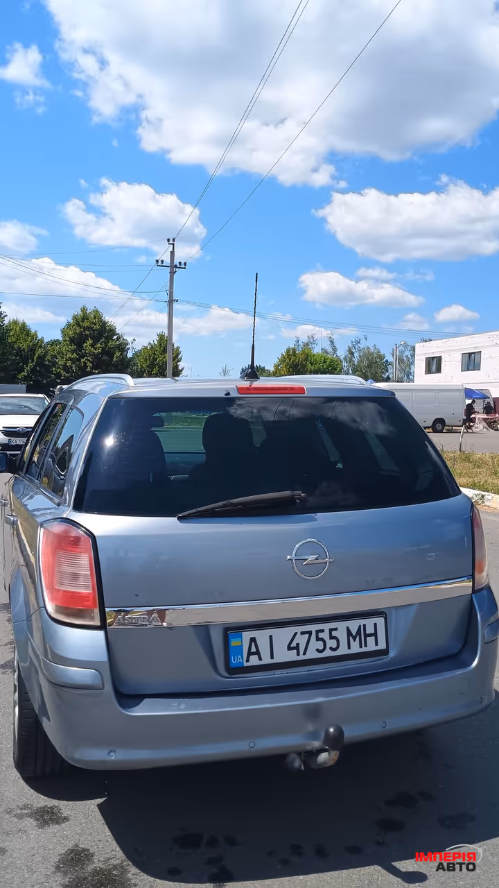 Opel Astra - фото 5