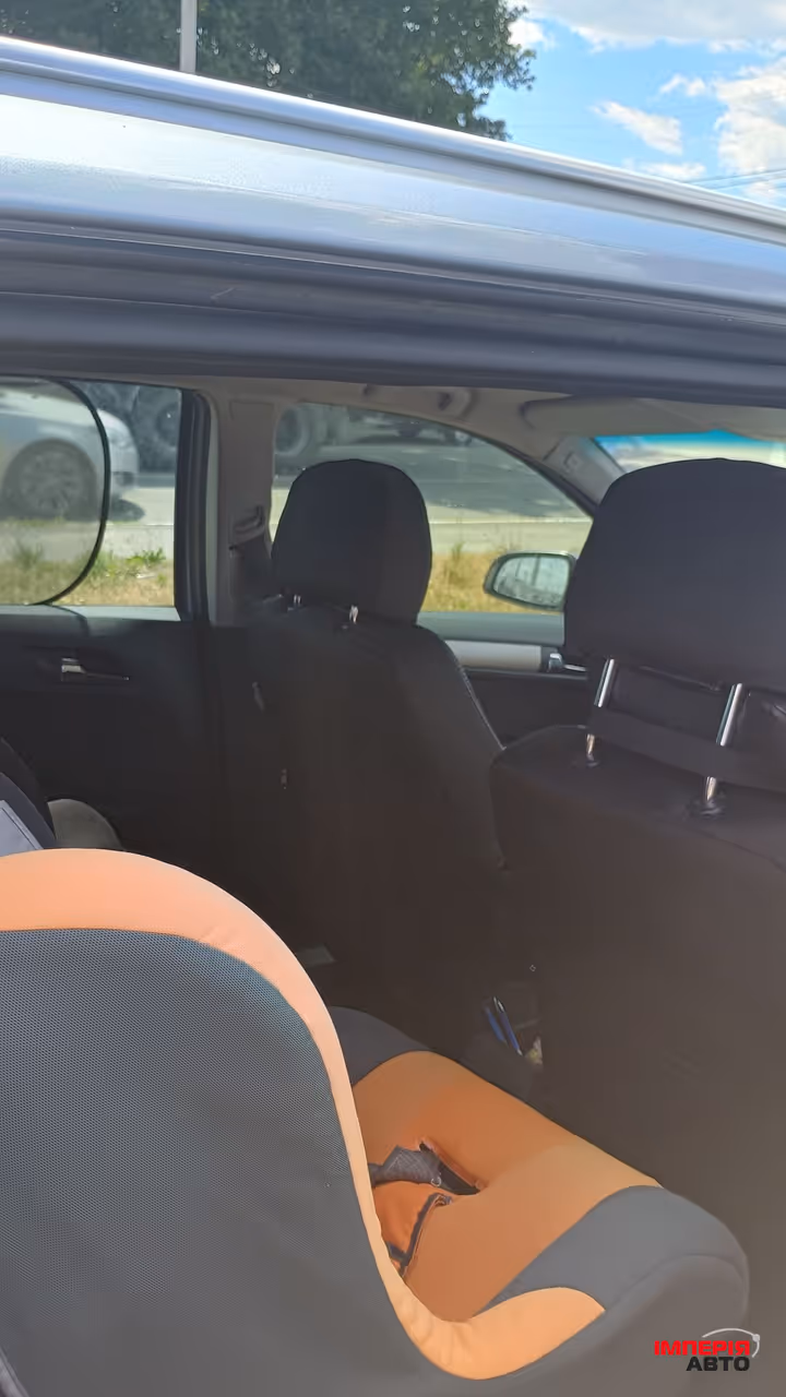 Opel Astra - фото 7