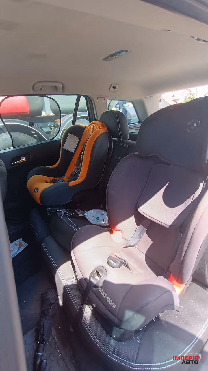 Opel Astra - фото 12