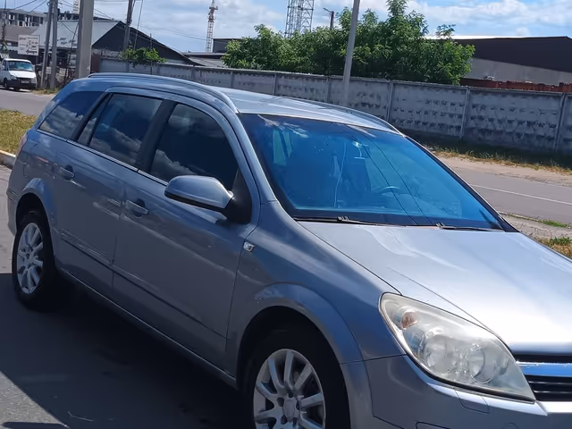 Opel Astra - фото 1