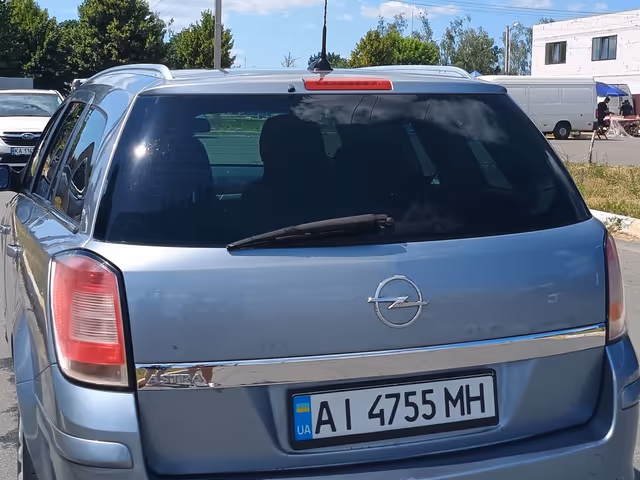 Opel Astra - фото 5