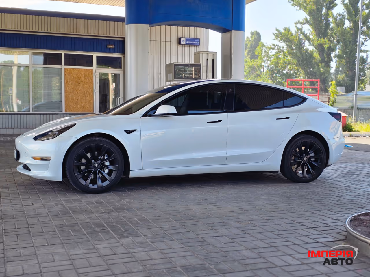 Tesla Model 3 - фото 11