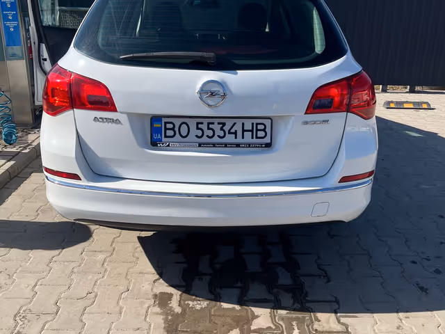 Opel Astra - фото 5